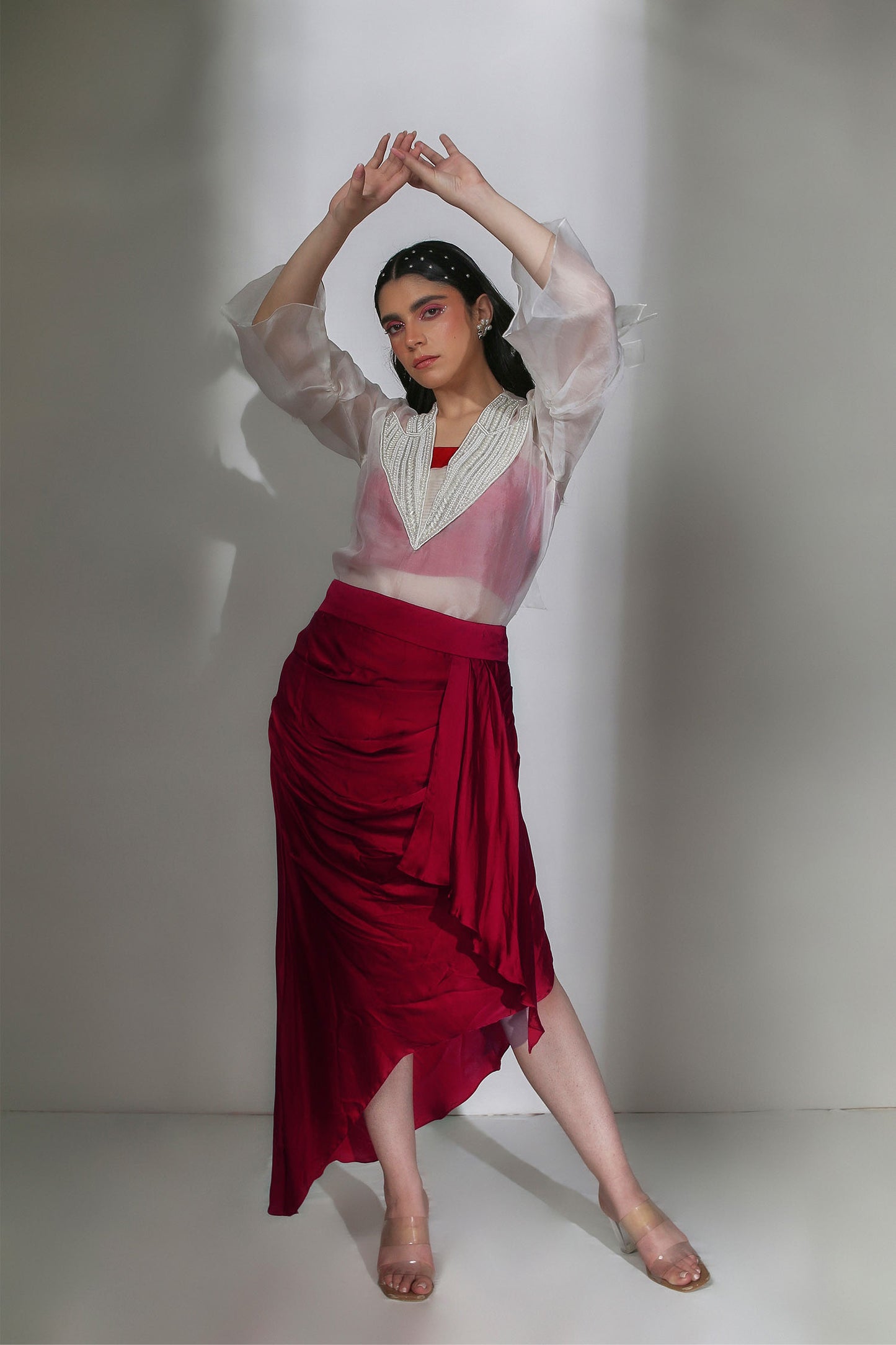 Ezra - Ivory Organza V-Neck Top With Pearl Hand-Embroidery on the Collar & Bows Paired with a Scarlet Red Draped Skirt