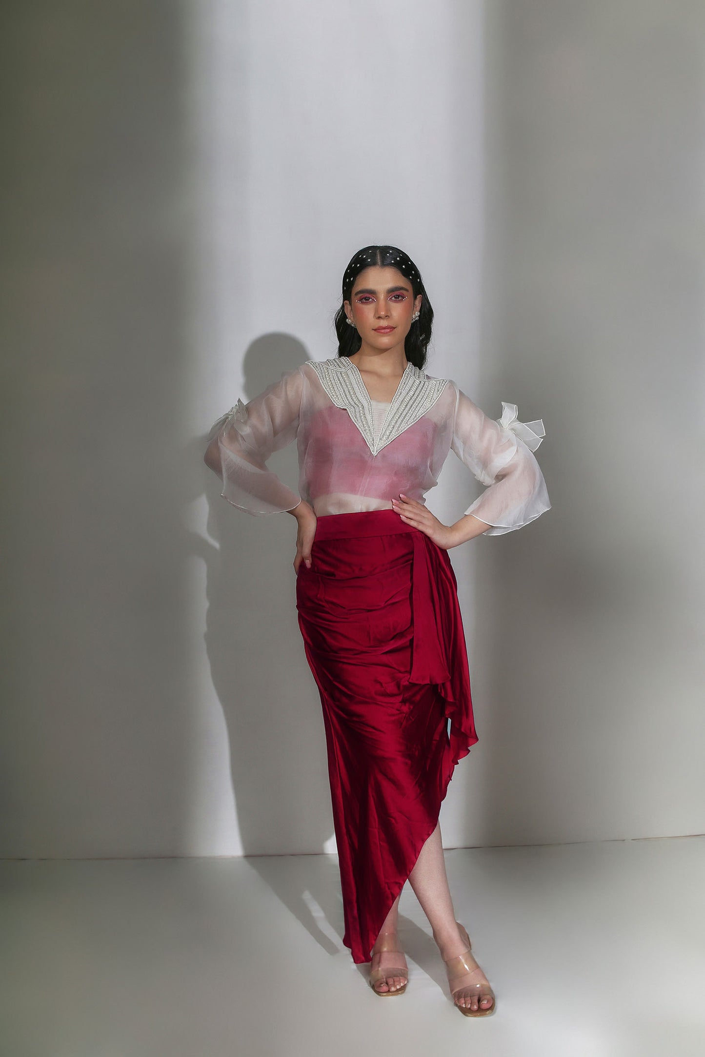 Ezra - Ivory Organza V-Neck Top With Pearl Hand-Embroidery on the Collar & Bows Paired with a Scarlet Red Draped Skirt