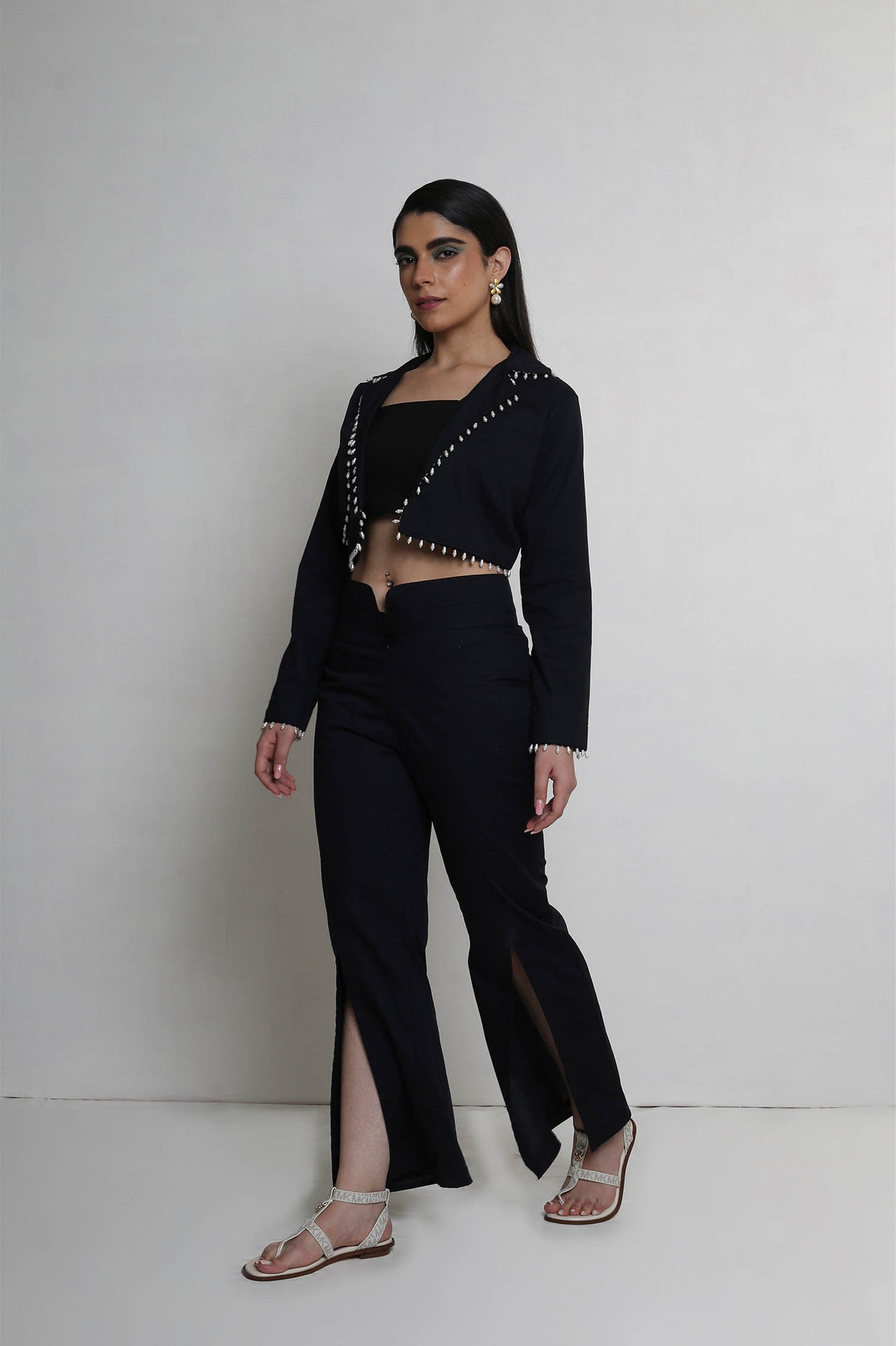Alayna - Black Cropped Trench Jacket With Pearl Drops, Flared Pants With Front Open Slit Panel & Cropped Bustier