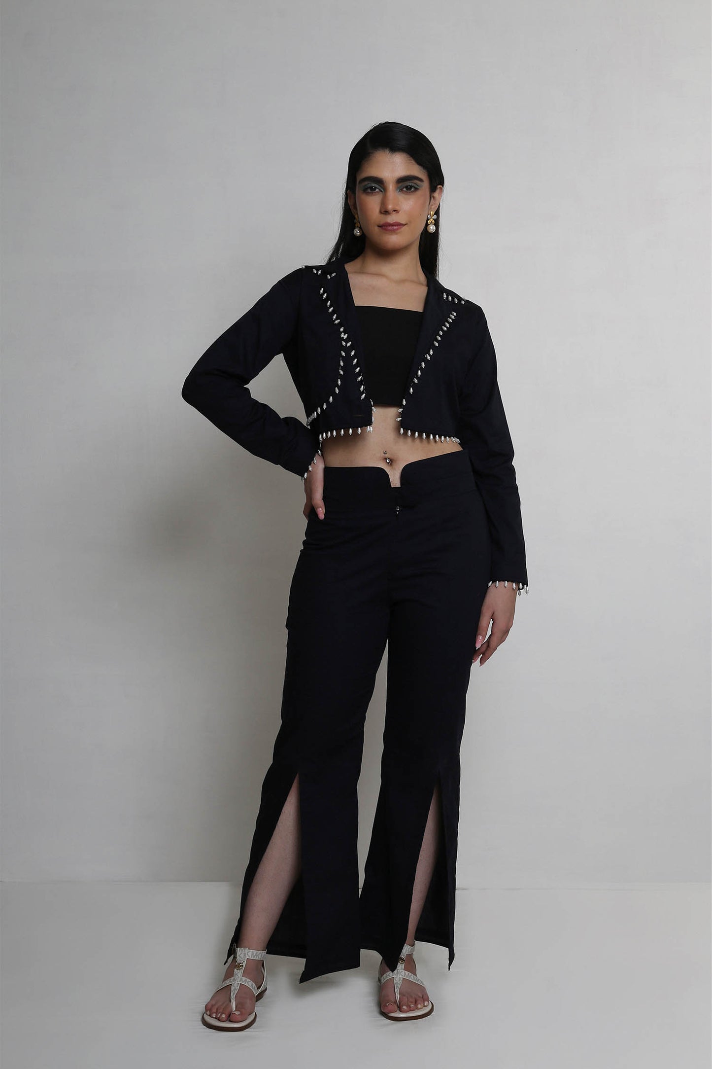Alayna - Black Cropped Trench Jacket With Pearl Drops, Flared Pants With Front Open Slit Panel & Cropped Bustier